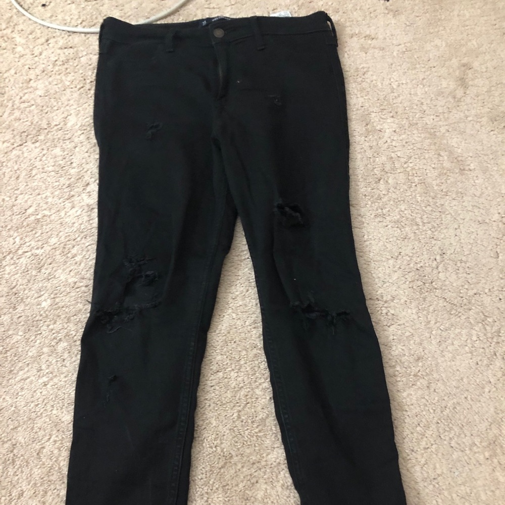 ripped black holliester jeans